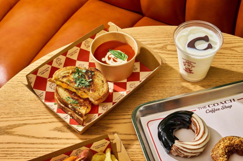 cheese sandwich, chocolate milk, coach coffee shop